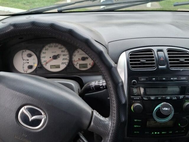 Серый Мазда Премаси, объемом двигателя 2 л и пробегом 320 тыс. км за 1650 $, фото 5 на Automoto.ua