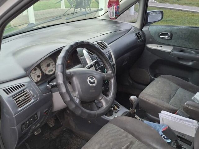 Серый Мазда Премаси, объемом двигателя 2 л и пробегом 320 тыс. км за 1650 $, фото 4 на Automoto.ua