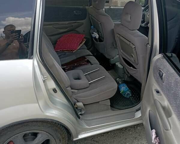 Серый Мазда Премаси, объемом двигателя 2 л и пробегом 200 тыс. км за 3100 $, фото 4 на Automoto.ua