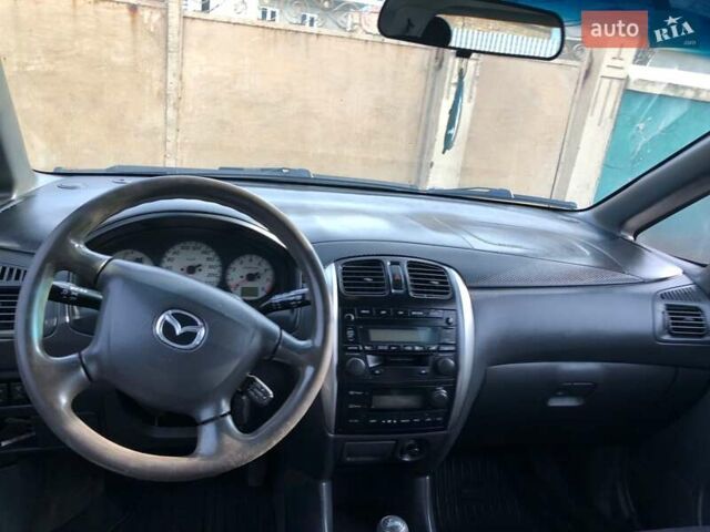 Серый Мазда Премаси, объемом двигателя 2 л и пробегом 200 тыс. км за 4000 $, фото 3 на Automoto.ua