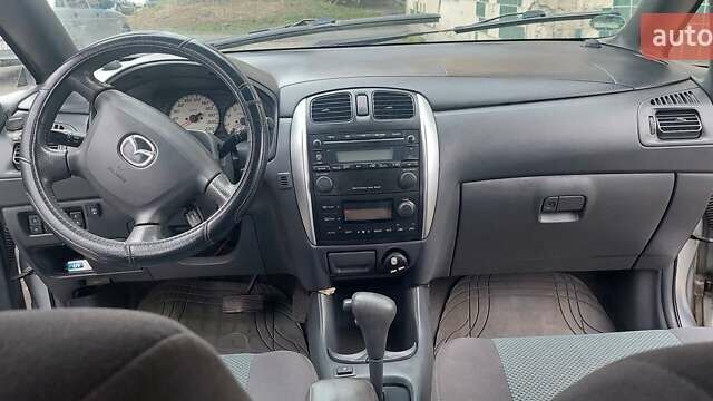 Серый Мазда Премаси, объемом двигателя 2 л и пробегом 250 тыс. км за 2800 $, фото 13 на Automoto.ua