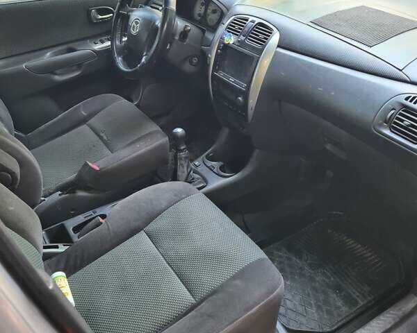 Сірий Мазда Премасі, об'ємом двигуна 1.8 л та пробігом 250 тис. км за 1900 $, фото 8 на Automoto.ua