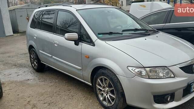 Серый Мазда Премаси, объемом двигателя 2 л и пробегом 250 тыс. км за 2800 $, фото 2 на Automoto.ua