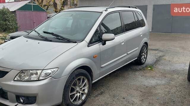 Серый Мазда Премаси, объемом двигателя 2 л и пробегом 250 тыс. км за 2800 $, фото 4 на Automoto.ua