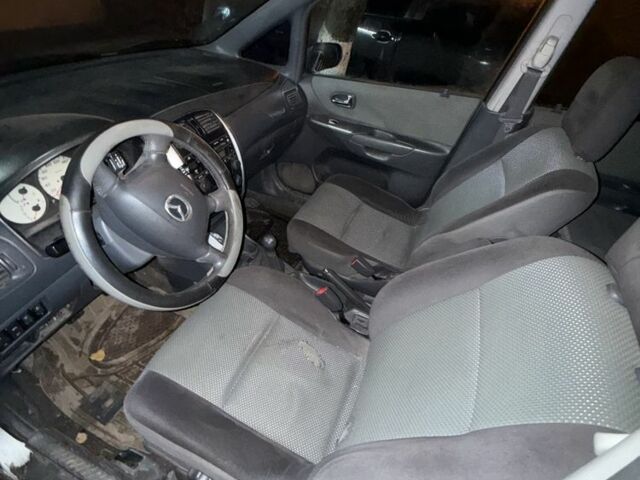 Серый Мазда Премаси, объемом двигателя 2 л и пробегом 240 тыс. км за 1250 $, фото 5 на Automoto.ua