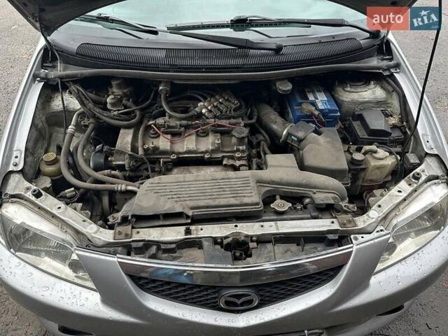 Серый Мазда Премаси, объемом двигателя 2 л и пробегом 290 тыс. км за 3800 $, фото 4 на Automoto.ua