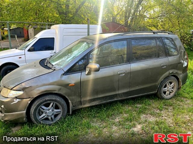 Серый Мазда Премаси, объемом двигателя 2 л и пробегом 190 тыс. км за 1400 $, фото 1 на Automoto.ua