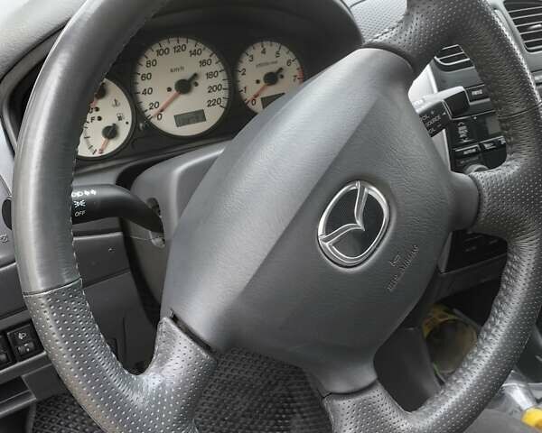 Серый Мазда Премаси, объемом двигателя 1.84 л и пробегом 137 тыс. км за 4350 $, фото 16 на Automoto.ua