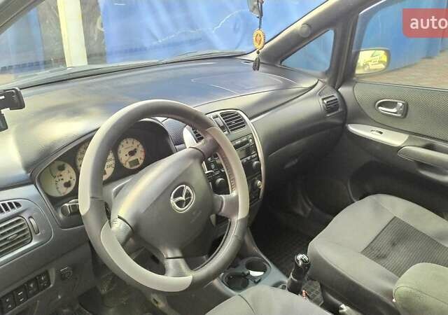 Серый Мазда Премаси, объемом двигателя 1.8 л и пробегом 245 тыс. км за 4500 $, фото 9 на Automoto.ua