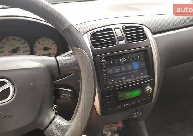 Серый Мазда Премаси, объемом двигателя 1.8 л и пробегом 245 тыс. км за 4500 $, фото 13 на Automoto.ua