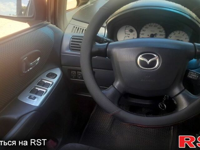 Серый Мазда Премаси, объемом двигателя 2 л и пробегом 257 тыс. км за 3500 $, фото 5 на Automoto.ua