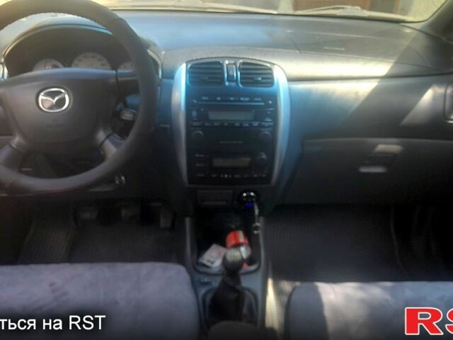 Серый Мазда Премаси, объемом двигателя 2 л и пробегом 257 тыс. км за 3500 $, фото 6 на Automoto.ua