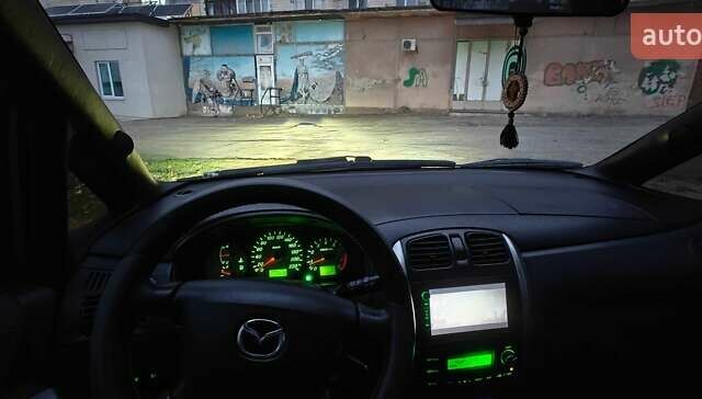 Серый Мазда Премаси, объемом двигателя 1.8 л и пробегом 245 тыс. км за 4500 $, фото 1 на Automoto.ua