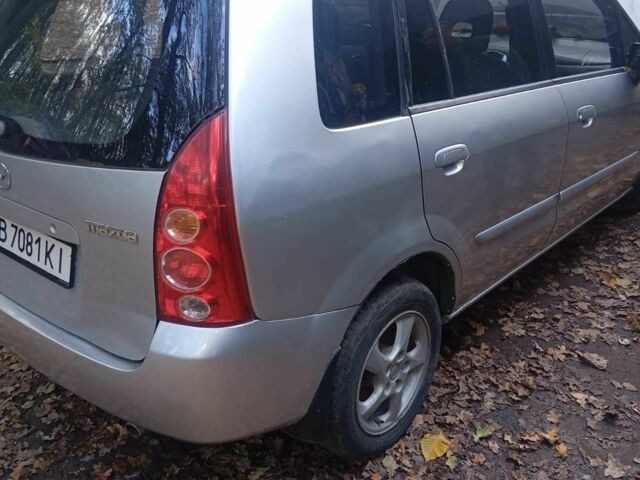 Серый Мазда Премаси, объемом двигателя 1.8 л и пробегом 120 тыс. км за 2000 $, фото 2 на Automoto.ua