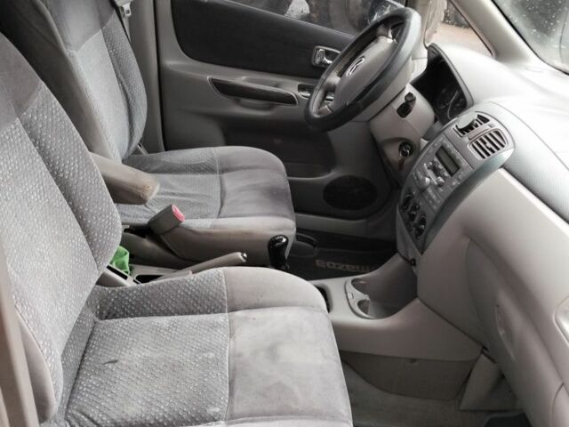 Серый Мазда Премаси, объемом двигателя 2 л и пробегом 307 тыс. км за 1548 $, фото 1 на Automoto.ua