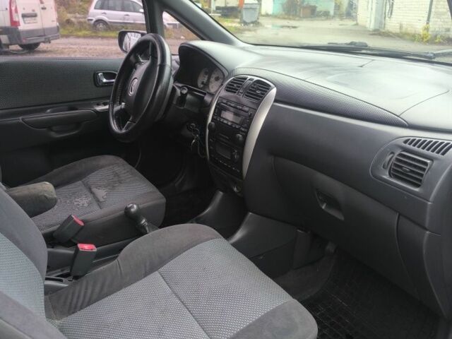 Серый Мазда Премаси, объемом двигателя 1.8 л и пробегом 397 тыс. км за 2200 $, фото 2 на Automoto.ua