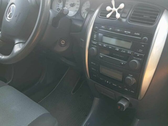 Серый Мазда Премаси, объемом двигателя 2 л и пробегом 230 тыс. км за 2450 $, фото 7 на Automoto.ua