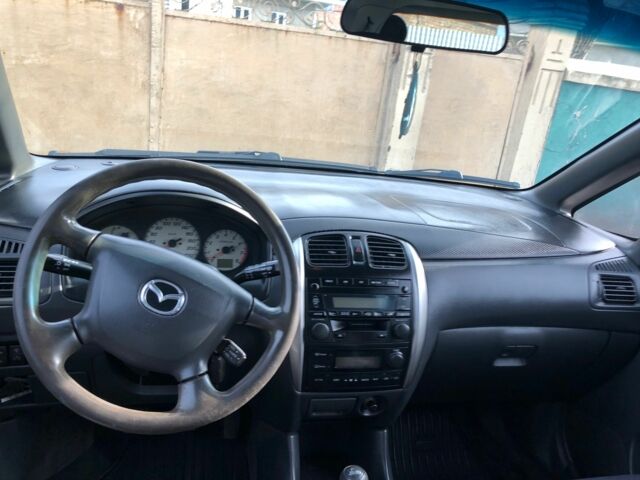Серый Мазда Премаси, объемом двигателя 2 л и пробегом 200 тыс. км за 4000 $, фото 4 на Automoto.ua