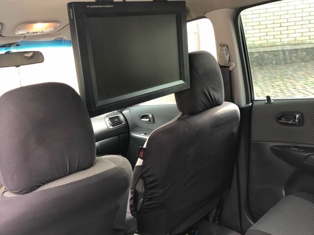 Серый Мазда Премаси, объемом двигателя 2 л и пробегом 200 тыс. км за 4000 $, фото 6 на Automoto.ua