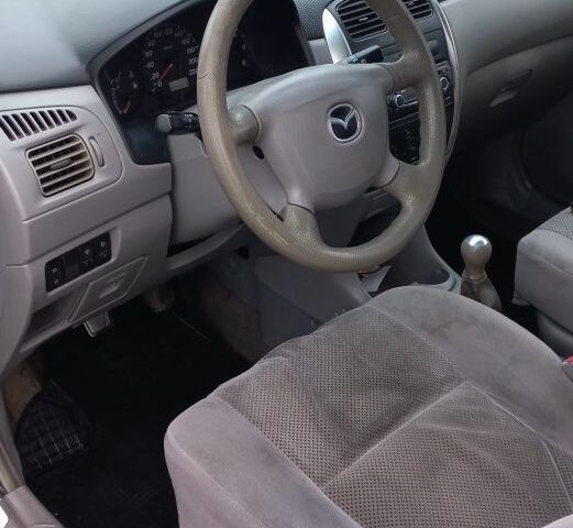 Серый Мазда Премаси, объемом двигателя 2 л и пробегом 324 тыс. км за 3500 $, фото 4 на Automoto.ua