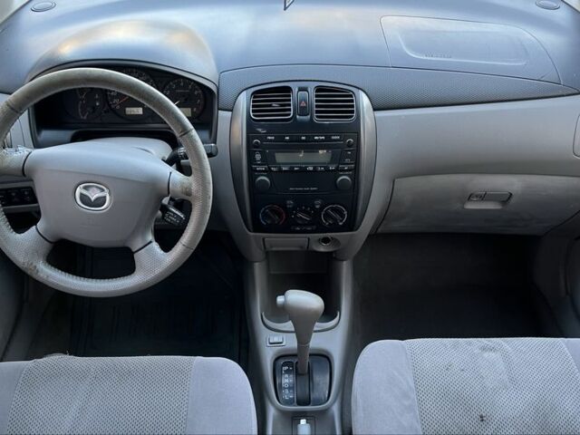 Серый Мазда Премаси, объемом двигателя 2 л и пробегом 290 тыс. км за 1299 $, фото 7 на Automoto.ua