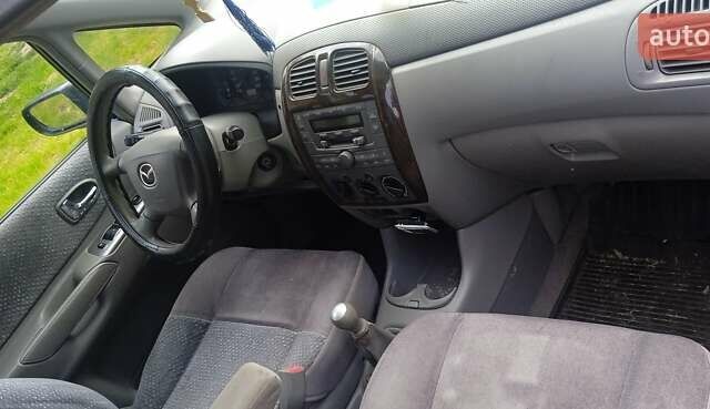 Синий Мазда Премаси, объемом двигателя 2 л и пробегом 100 тыс. км за 1600 $, фото 7 на Automoto.ua