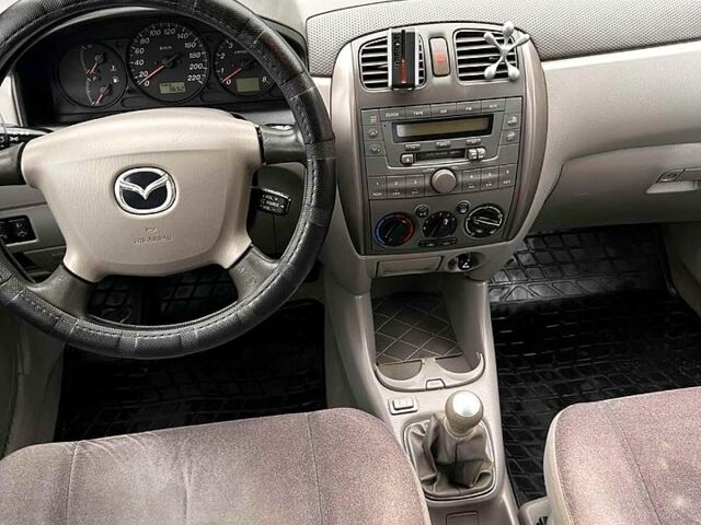 Синій Мазда Премасі, об'ємом двигуна 1.8 л та пробігом 247 тис. км за 2600 $, фото 5 на Automoto.ua