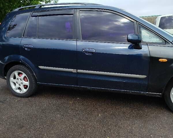 Синий Мазда Премаси, объемом двигателя 1.84 л и пробегом 422 тыс. км за 2500 $, фото 3 на Automoto.ua