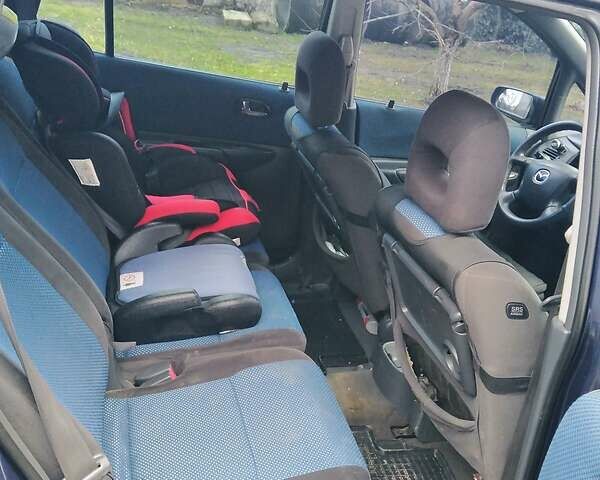 Синий Мазда Премаси, объемом двигателя 1.8 л и пробегом 320 тыс. км за 2200 $, фото 3 на Automoto.ua