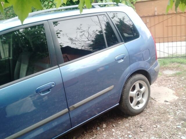 Синій Мазда Премасі, об'ємом двигуна 1.8 л та пробігом 250 тис. км за 2799 $, фото 1 на Automoto.ua