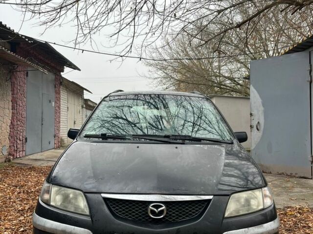 Синий Мазда Премаси, объемом двигателя 2 л и пробегом 200 тыс. км за 1072 $, фото 2 на Automoto.ua