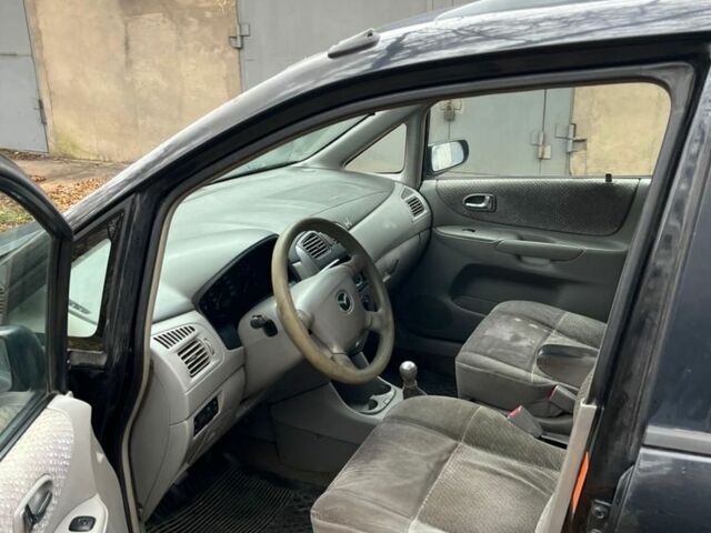 Синий Мазда Премаси, объемом двигателя 2 л и пробегом 200 тыс. км за 1072 $, фото 3 на Automoto.ua