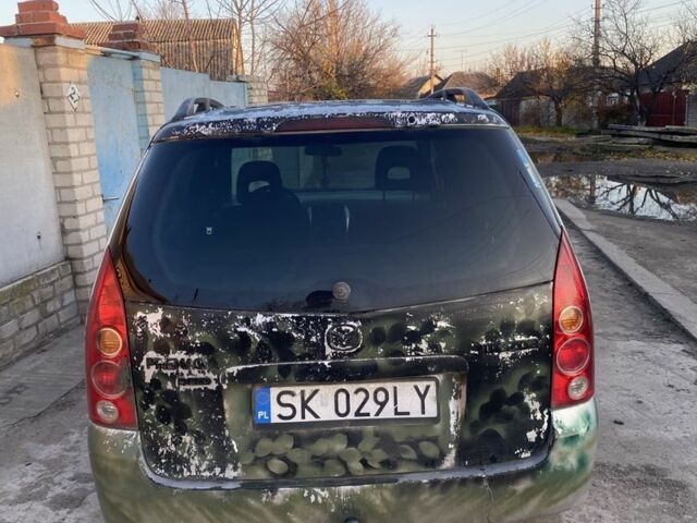 Зеленый Мазда Премаси, объемом двигателя 2 л и пробегом 444 тыс. км за 350 $, фото 4 на Automoto.ua