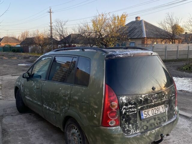 Зеленый Мазда Премаси, объемом двигателя 2 л и пробегом 444 тыс. км за 350 $, фото 3 на Automoto.ua
