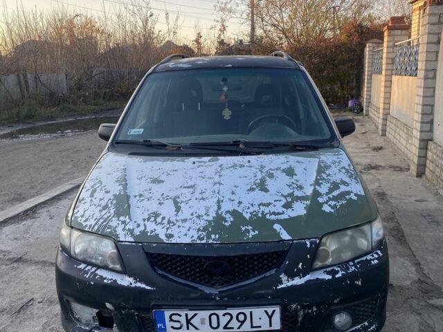 Зеленый Мазда Премаси, объемом двигателя 2 л и пробегом 444 тыс. км за 350 $, фото 2 на Automoto.ua