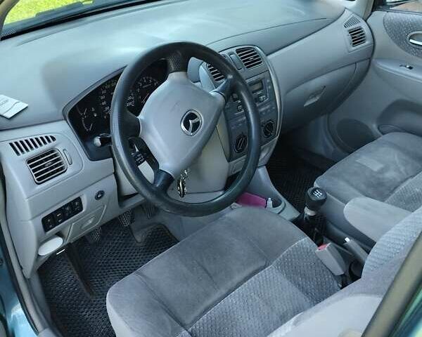 Зеленый Мазда Премаси, объемом двигателя 1.84 л и пробегом 300 тыс. км за 3600 $, фото 4 на Automoto.ua