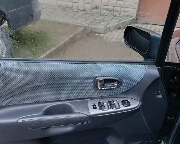 Зелений Мазда Премасі, об'ємом двигуна 2 л та пробігом 296 тис. км за 2100 $, фото 3 на Automoto.ua