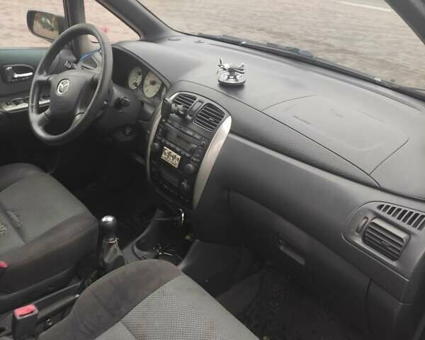 Зеленый Мазда Премаси, объемом двигателя 2 л и пробегом 300 тыс. км за 2200 $, фото 6 на Automoto.ua