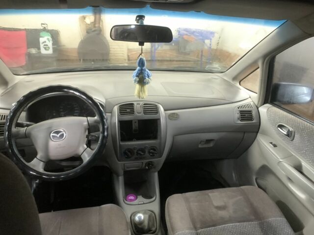 Зеленый Мазда Премаси, объемом двигателя 2 л и пробегом 250 тыс. км за 900 $, фото 1 на Automoto.ua