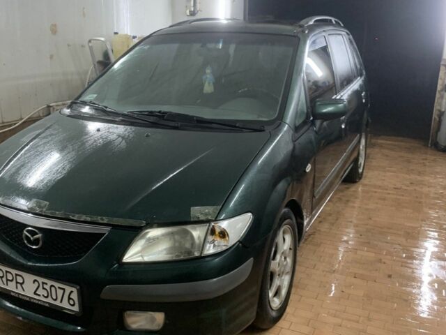 Зеленый Мазда Премаси, объемом двигателя 2 л и пробегом 250 тыс. км за 900 $, фото 5 на Automoto.ua
