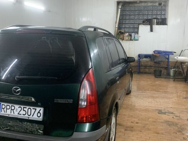 Зеленый Мазда Премаси, объемом двигателя 2 л и пробегом 250 тыс. км за 900 $, фото 7 на Automoto.ua