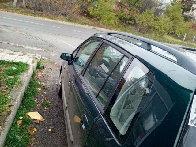 Зеленый Мазда Премаси, объемом двигателя 2 л и пробегом 87 тыс. км за 1750 $, фото 3 на Automoto.ua