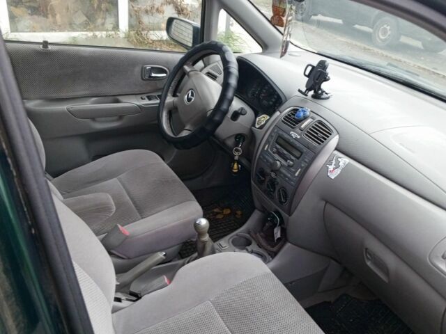 Зеленый Мазда Премаси, объемом двигателя 2 л и пробегом 87 тыс. км за 1750 $, фото 11 на Automoto.ua