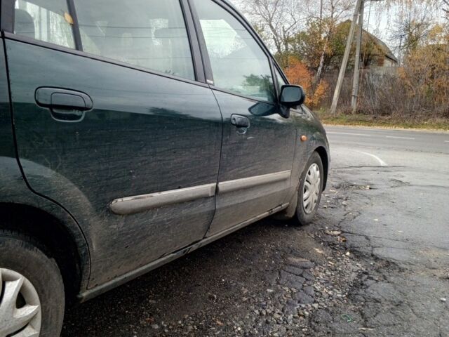 Зеленый Мазда Премаси, объемом двигателя 2 л и пробегом 87 тыс. км за 1750 $, фото 4 на Automoto.ua