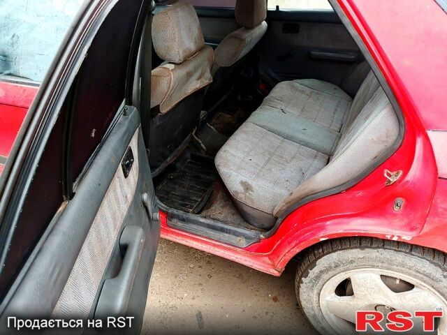 Красный Мазда Протеж, объемом двигателя 1.8 л и пробегом 300 тыс. км за 500 $, фото 5 на Automoto.ua