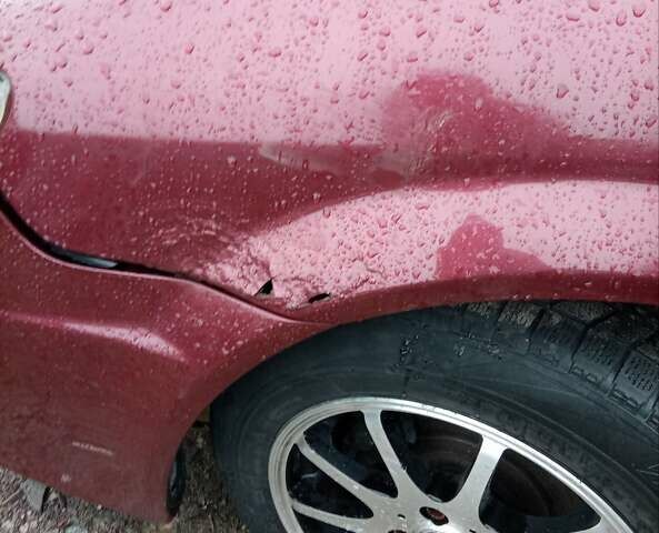 Красный Мазда Протеж, объемом двигателя 1.99 л и пробегом 200 тыс. км за 1500 $, фото 6 на Automoto.ua