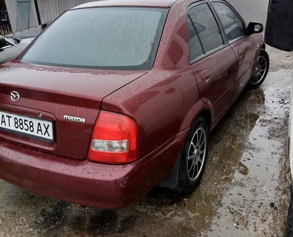 Красный Мазда Протеж, объемом двигателя 1.99 л и пробегом 200 тыс. км за 1500 $, фото 3 на Automoto.ua