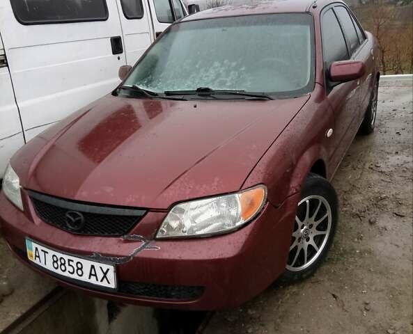 Красный Мазда Протеж, объемом двигателя 1.99 л и пробегом 200 тыс. км за 1500 $, фото 1 на Automoto.ua