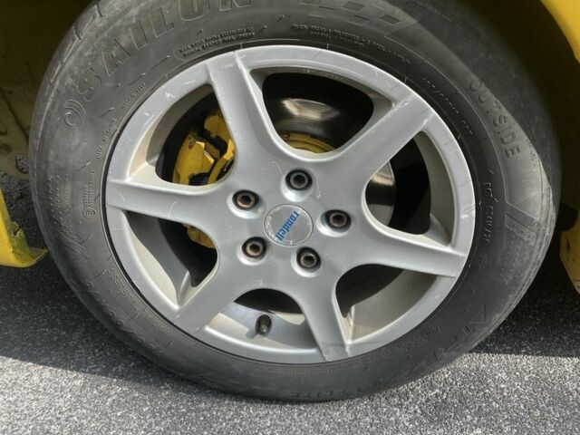 Желтый Мазда Протеж, объемом двигателя 2 л и пробегом 210 тыс. км за 3000 $, фото 7 на Automoto.ua