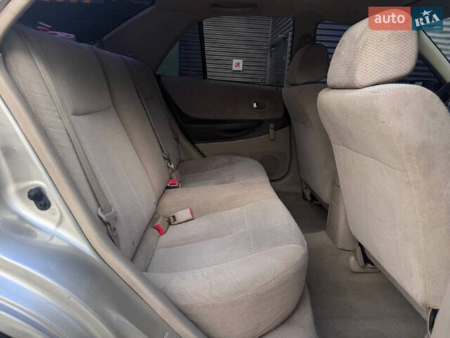 Серый Мазда Протеж, объемом двигателя 2 л и пробегом 85 тыс. км за 3600 $, фото 10 на Automoto.ua